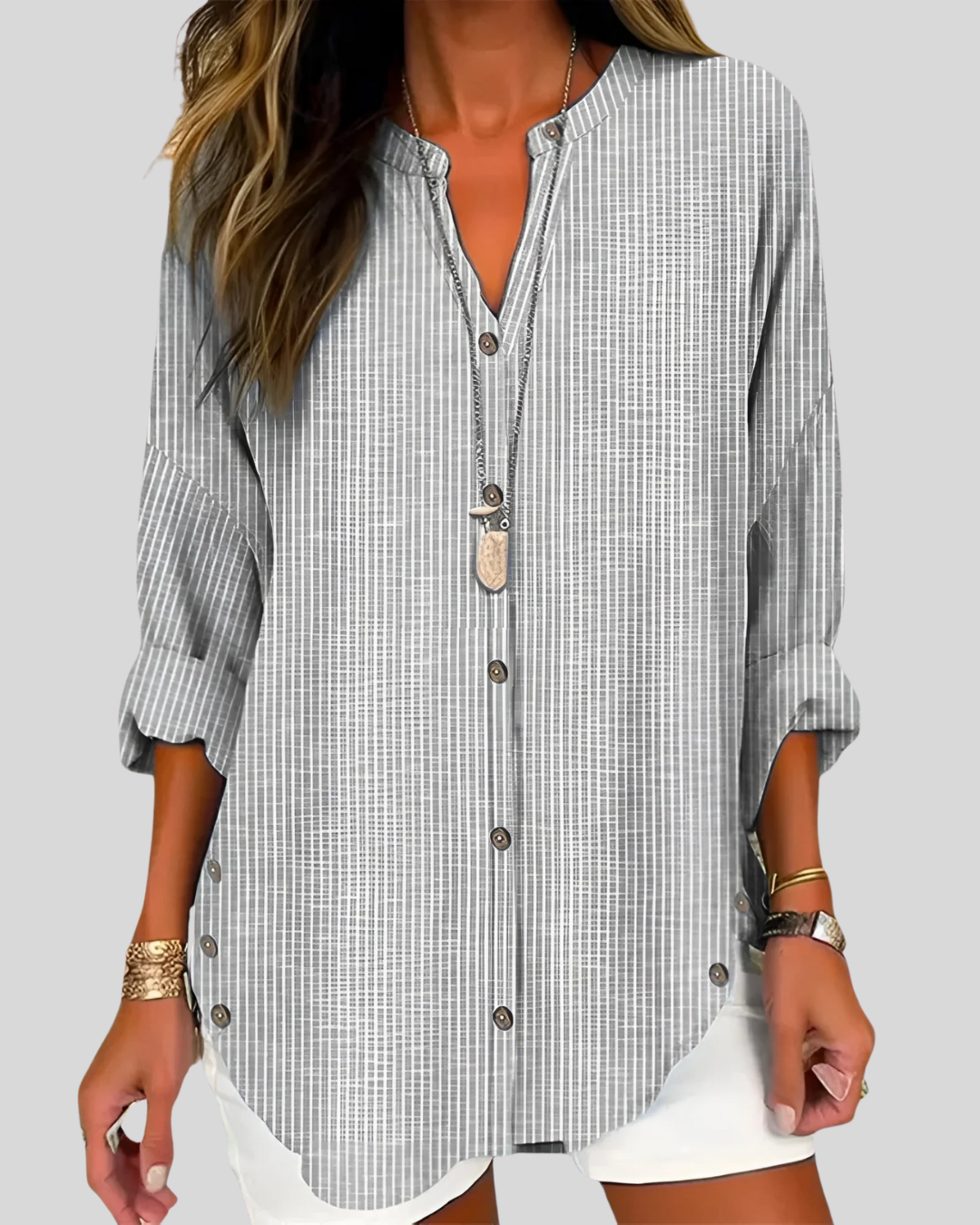 Modehus | Elegant Bluse med V-hals og Vertikale Striper