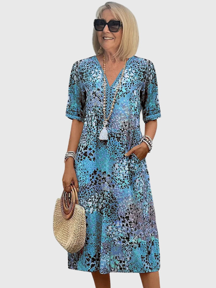 Modehus | Elegant Midi Blomsterkjole