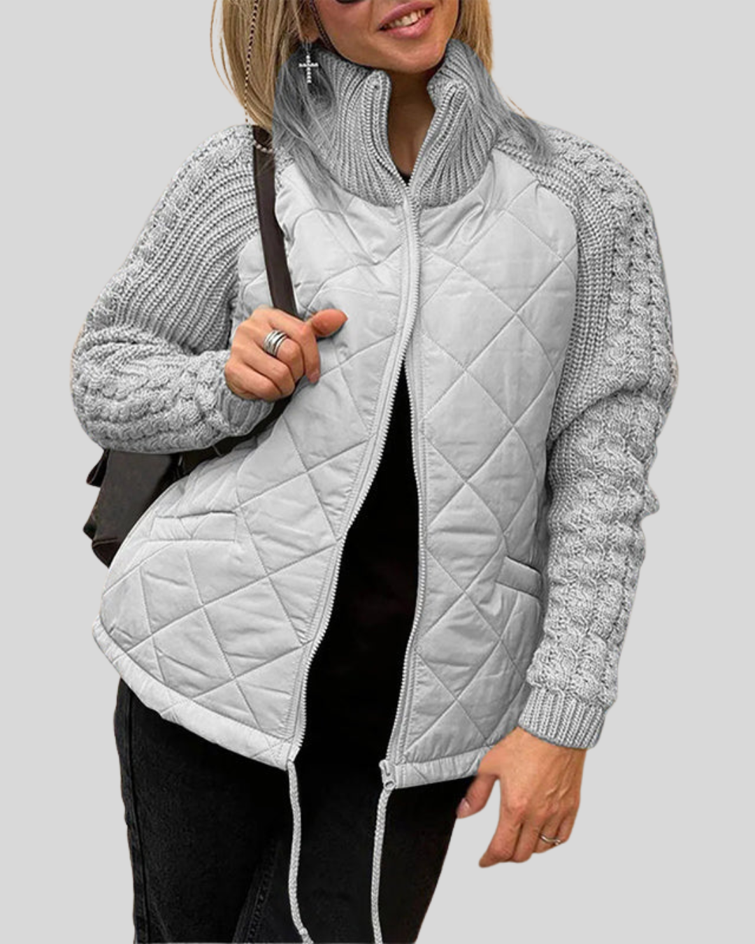 Modehus | Elegant quiltet jakke med strikkede ermer